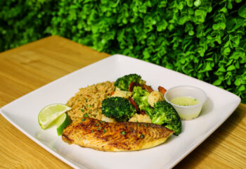 GARLIC BUTTER TILAPIA W DIRTY RICE